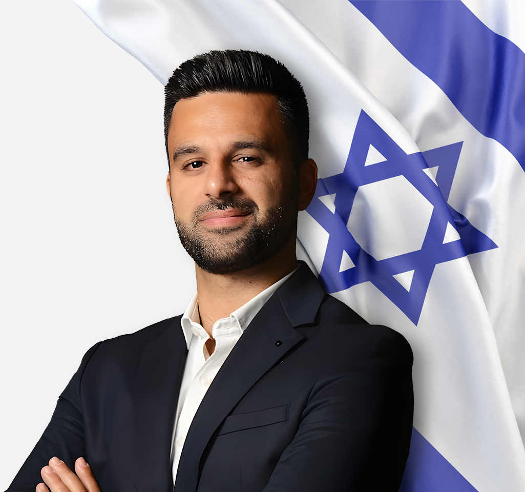 Yoseph Haddad with flag of Israel